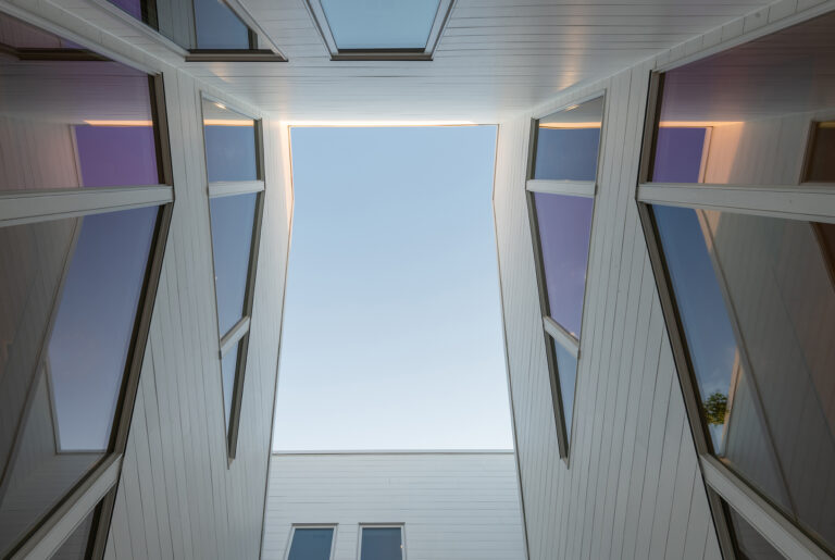 The shared courtyard of a condominium building in Captiol Hill imbues the center of each unit with natural light.ARCHITECTURE: EL STUDIO PHOTOGRAPHY: Paul Burk