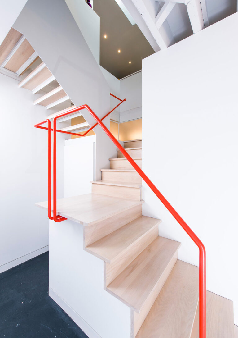 A narrow, sky-lit volume buffers the public and private space in this live-work carriage house. ARCHITECTURE: EL STUDIO PHOTOGRAPHY: Pepper Watkins