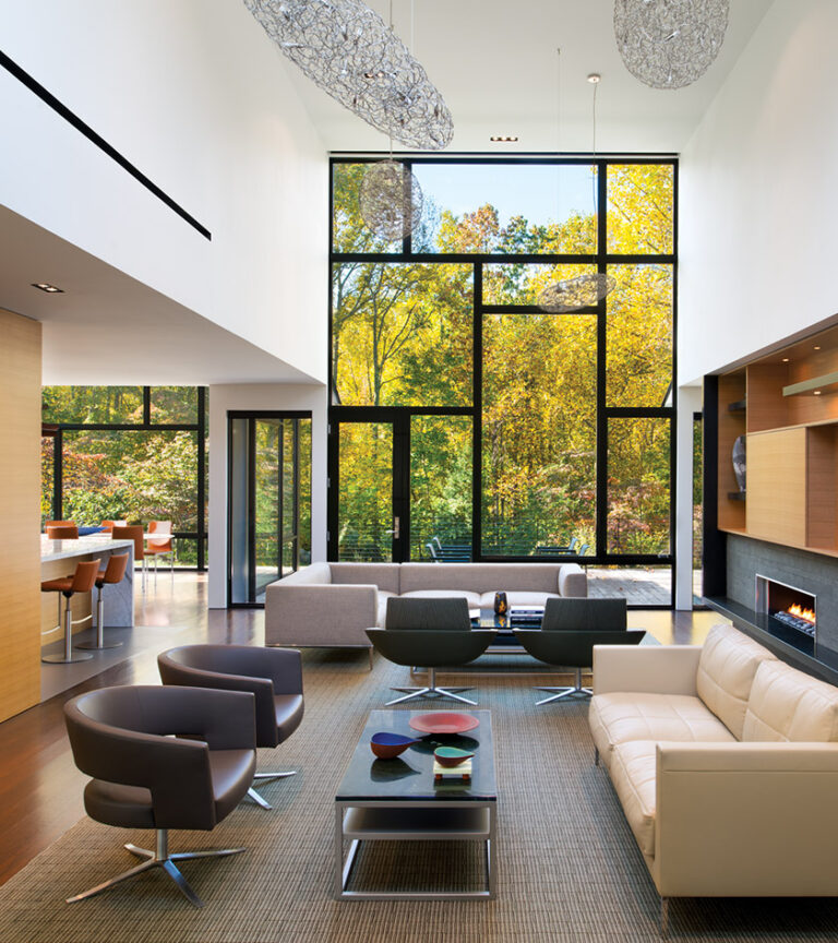 A living room features “interlacing” seating groups. INTERIOR DESIGN: Baron Gurney Interiors PHOTOGRAPHY: Anice Hoachlander