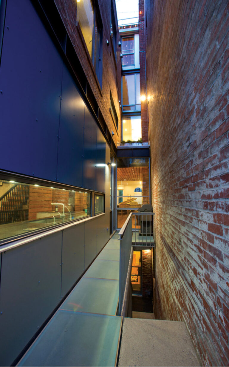 Natural light penetrates five stories into the basement. ARCHITECTURE: Carter + Burton Architecture, PLC PHOTOGRAPHY: Julie Roberts Home Team