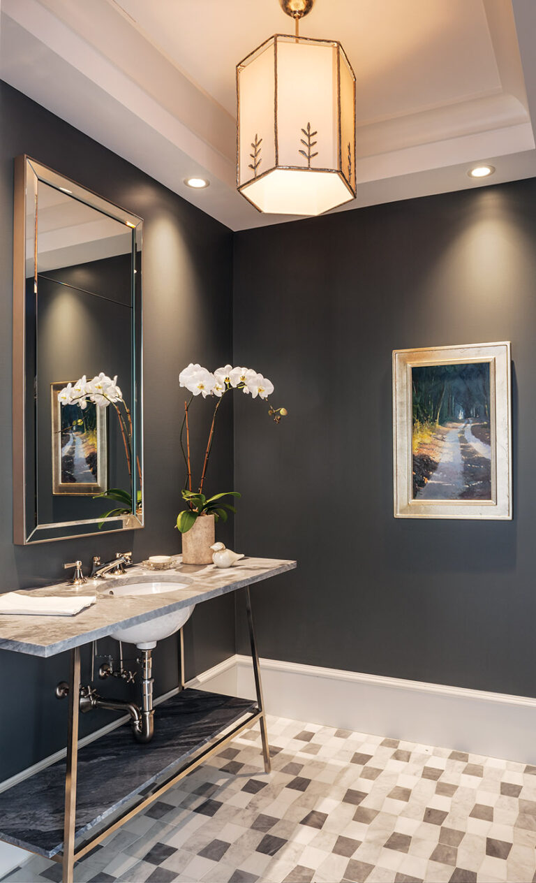 Walls painted in Farrow & Ball’s Down Pipe add drama to the powder room. INTERIOR DESIGN: Monarch Design DC PHOTOGRAPHY: Lydia Cutter