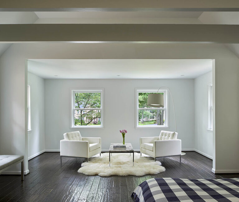 Scandinavian-inspired modern master suite renovation. Adding a front sitting room to the bedroom affords the couple a serene place to read and relax while making the space more inviting. ARCHITECTURE: CARNEMARK design + build PHOTOGRAPHY: Anice Hoachlander