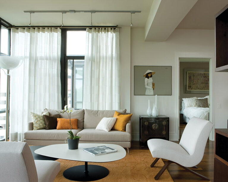 The designer created a sense of intimacy and calm in a Chevy Chase living room that complements the family’s Asian antiques with soft lines that are contemporary and clean. INTERIOR DESIGN: ColePrévost PHOTOGRAPHY: Angie Seckinger