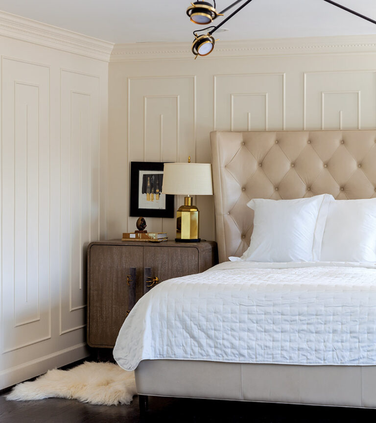 In a master bedroom, a Bernhardt bedstead is paired with a SHO Modern nightstand. INTERIOR DESIGN: Farnady Interiors PHOTOGRAPHY: Gwin Hunt