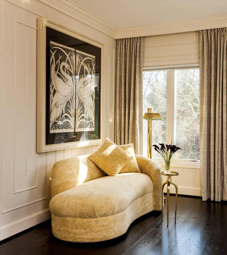 An original print by Art Nouveau illustrator Walter Crane hangs above an Art Deco chaise. INTERIOR DESIGN: Farnady Interiors PHOTOGRAPHY: Gwin Hunt