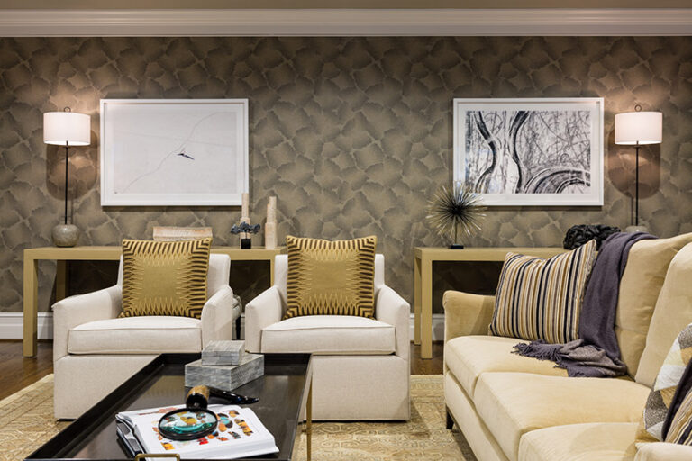 Intended for a family with older kids, a “grown up” basement room in McLean is warmed by textured wallpaper, a velvet sofa and swivel chairs.INTERIOR DESIGN: Samantha Friedman Interior Designs, LLC PHOTOGRAPHY: Jesse Snyder