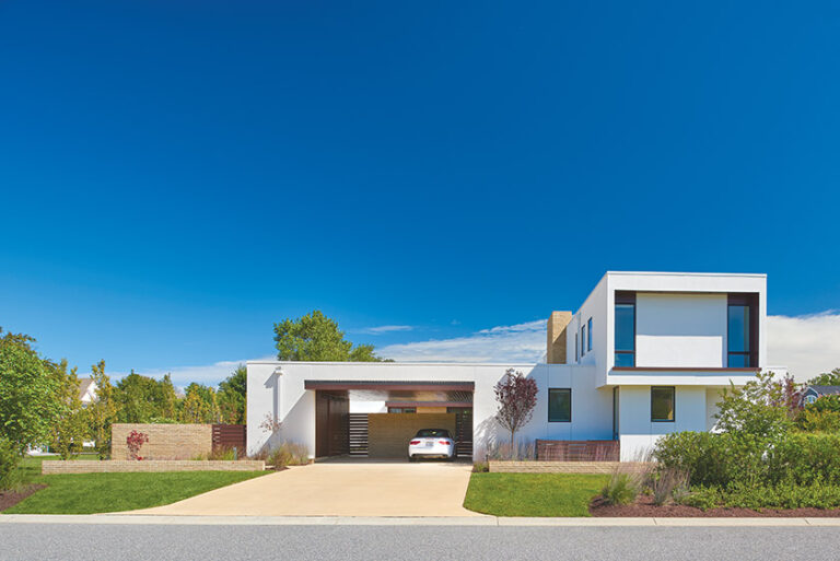 In a modern Rehoboth Beach garden, brick walls conceal a pool courtyard and further define the modern lines of the house. LANDSCAPE ARCHITECTURE: Horn & Co. PHOTOGRAPHY: Anice Hoachlander