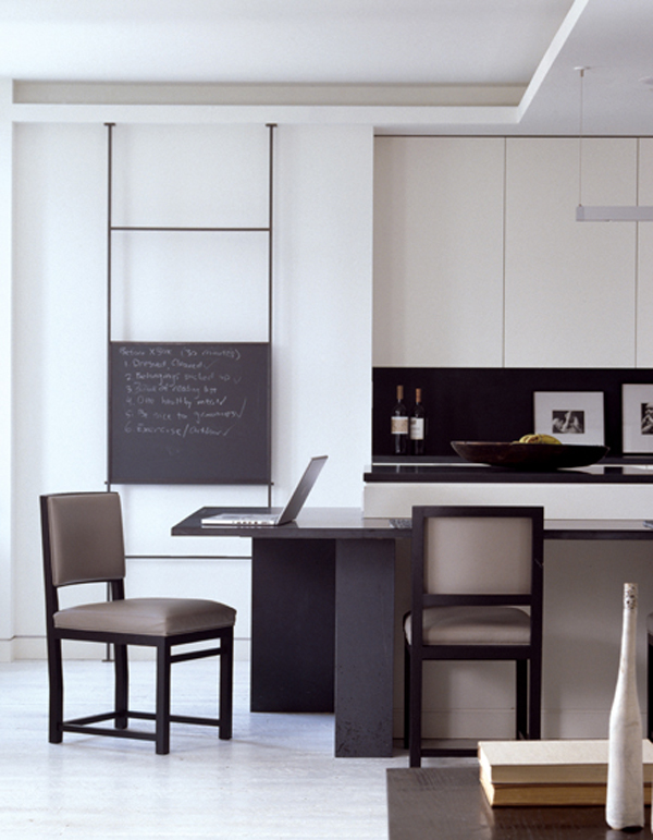 A kitchen doubles as an office in a space-savvy Ritz-Carlton condominium. ARCHITECTURE: Donald Lococo Architects, LLC PHOTOGRAPHY: Gordon Beall
