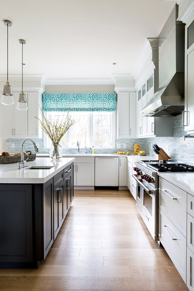Custom details like wide-plank, white-oak floors convey warmth and comfort—from the kitchen to the master bedroom. INTERIOR DESIGN: Sandra Meyers Design Studio PHOTOGRAPHY: Angie Seckinger