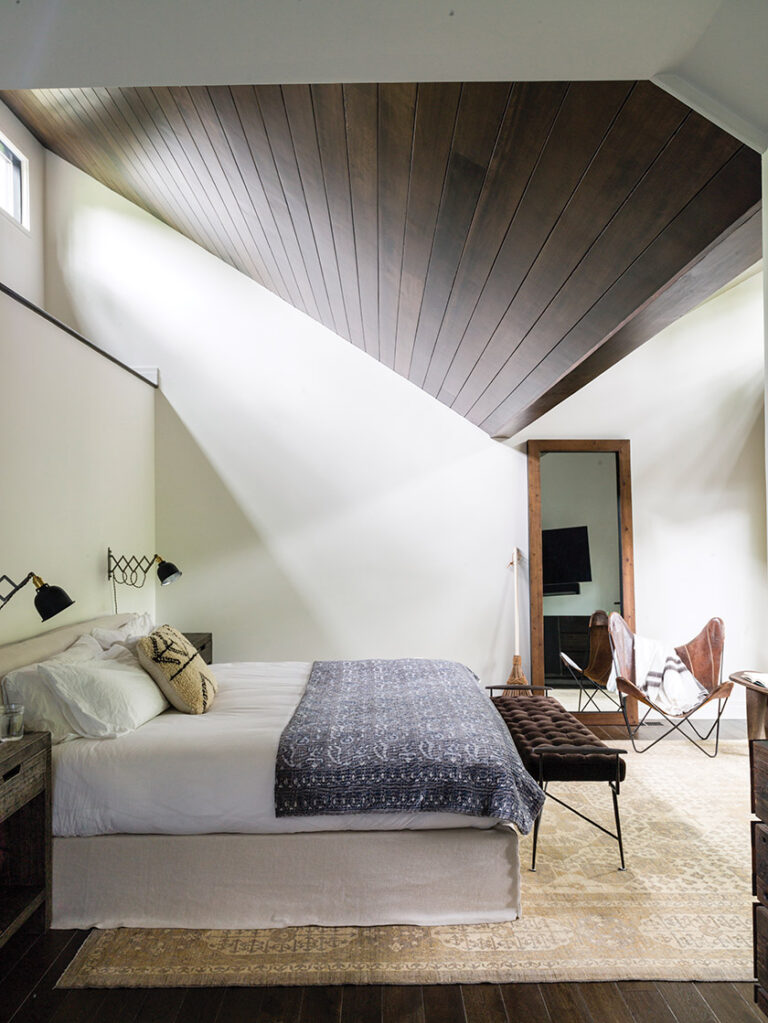 A expanded master bedroom boasting a new roofline and clerestory windows ARCHITECTURE: Rill Architects PHOTOGRAPHY: HELEN NORMAN