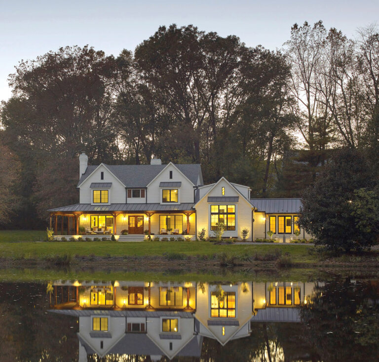 In a modern McLean renovation, sliding metal-framed doors connect the main living spaces to a rear garden; ARCHITECTURE: Studio 360 LLC PHOTOGRAPHY: Darren Setlow