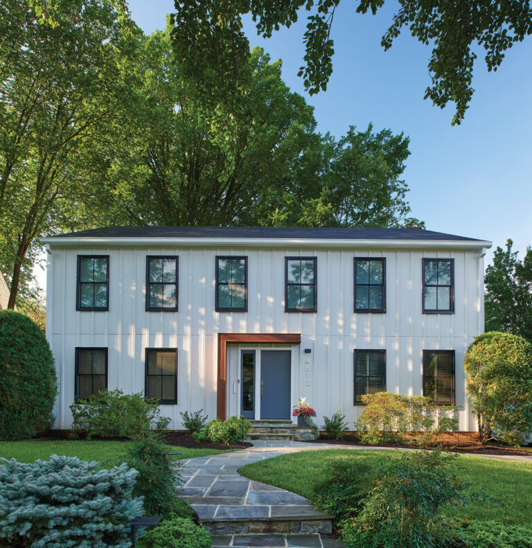 An exterior overhaul of a traditional Colonial home yields fresh, contemporary curb appeal. ARCHITECTURE: CAR-NEMRK design. + build PHOTOGRAPHY: Anice Hoachlander