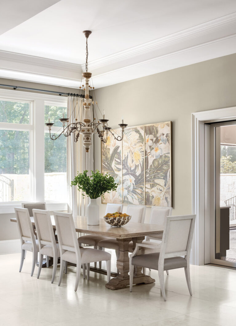 A floral art panel adds a pop of dramatic color and pattern to the serene and neutral breakfast room of a Great Falls home. INTERIOR DESIGN: Interior Concepts, Inc. PHOTOGRAPHY: Stylish Productions
