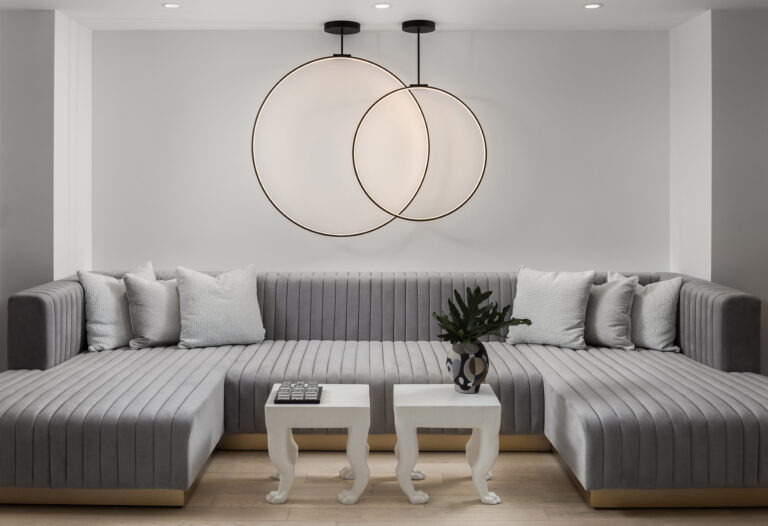 A cozy spot to curl up in the movie roomARCHITECTURE: The Drawing Board, Inc. PHOTOGRAPHY: Jenn Vierrier