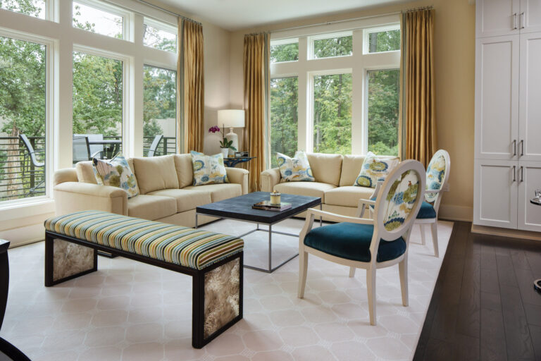 In a colorful play on a modern townhouse in Bethesda, the entire space is set in neutrals but enlivened with pops of bright hues. INTERIOR DESIGN: Samantha Friedman Interior Designs, LLC PHOTOGRAPHY: Jesse Snyder