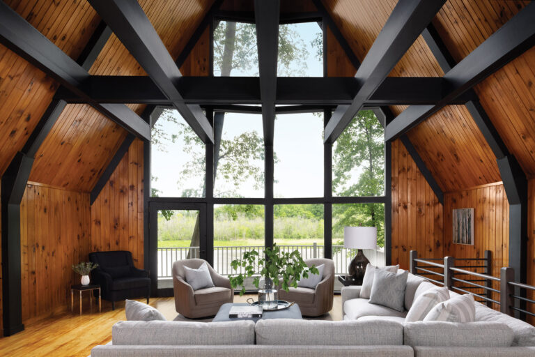 Friend revamped a Mid-Century Modern home, painting original beams in satin black to highlight the architecture. INTERIOR DESIGN: Amanda Friend Interior Design PHOTOGRAPHY: Robert Radifera