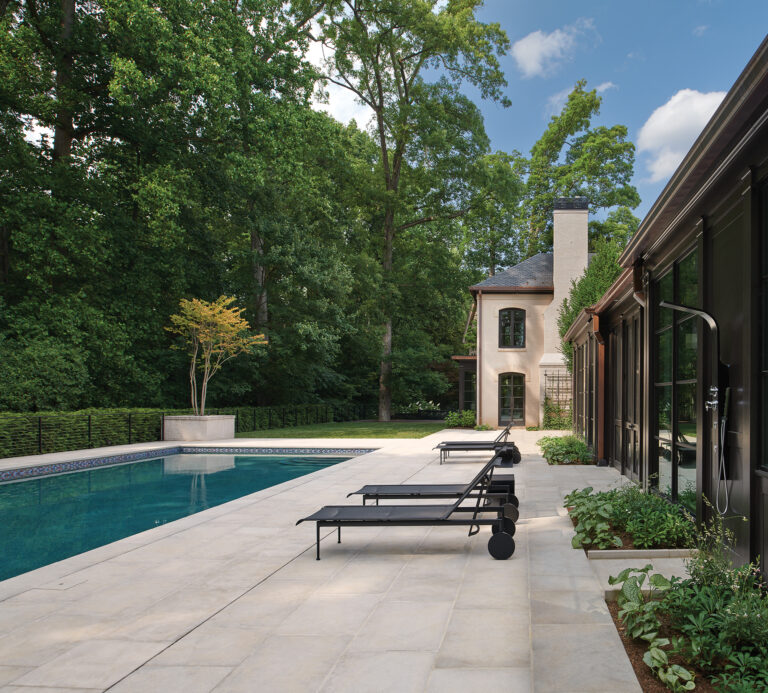 A seven-acre Vienna property comprises a residence with a pool and barn. LANDSCAPE ARCHITECTURE: Horn & Co. PHOTOGRAPHY: VSI Aerial LLC