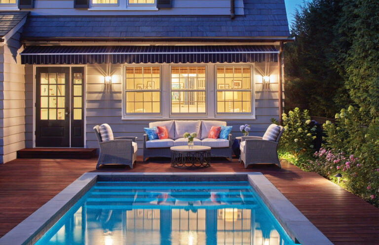 Soft lighting and cozy seating blend the indoors with the outdoors. LANDSCAPE ARCHITECTURE: Walnut Hill Landscape Company
