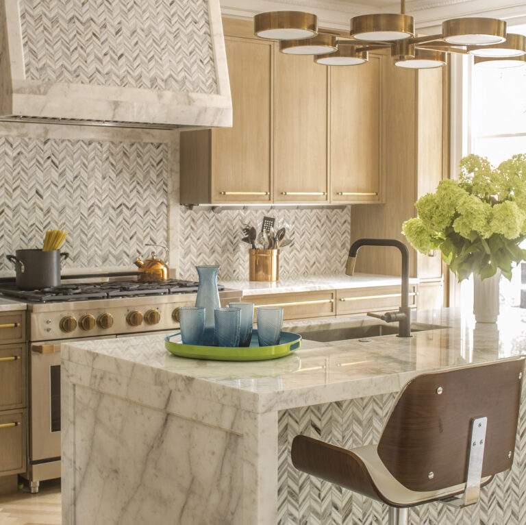 A Georgetown kitchen was a finalist in Dacor’s National Kitchen Design Contest, noted for its innovative use of glass tile and marble. INTERIOR DESIGN: Sroka Design, Inc. PHOTOGRAPHY: Erik Kvalsvik