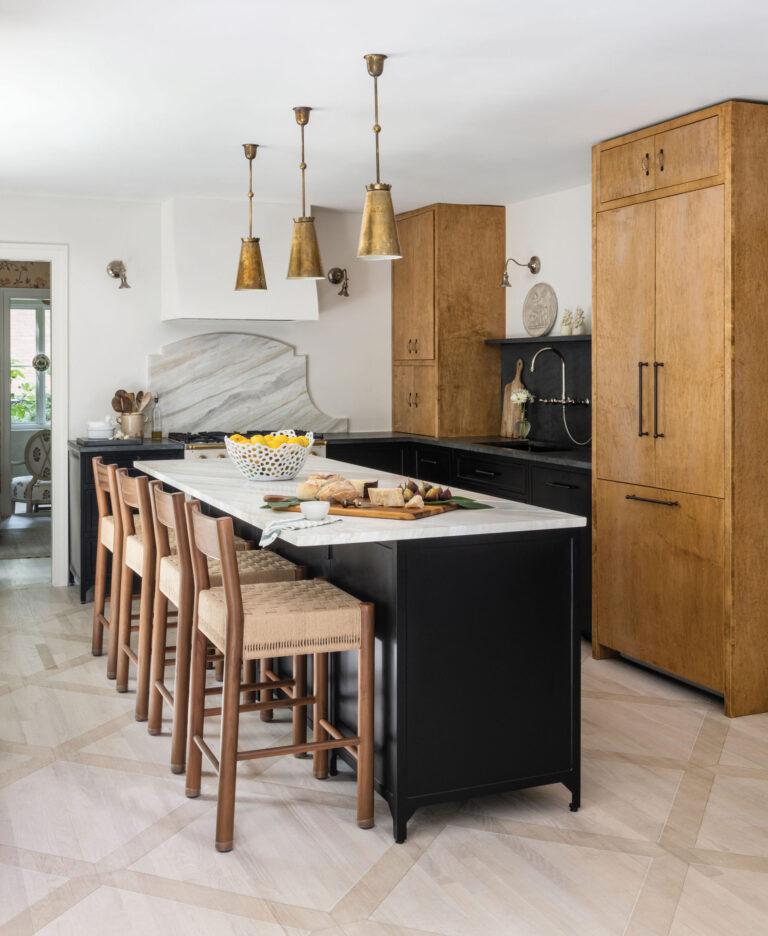 In a McLean kitchen redo, bespoke details rule, from painted floors to metal and wood cabinetry and a plaster range hood.